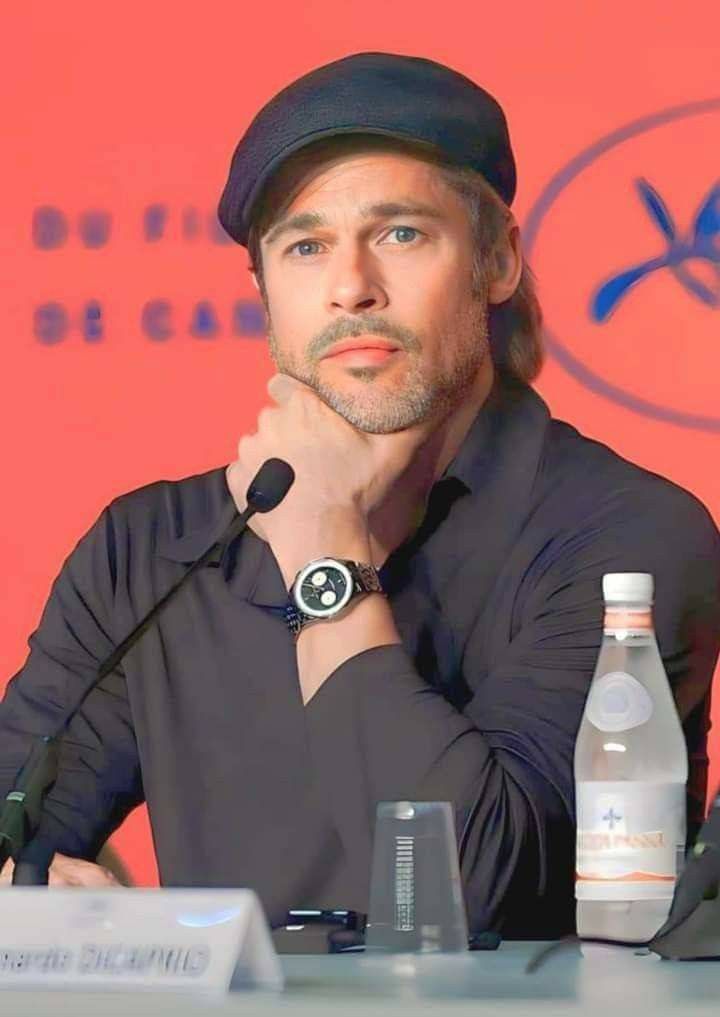 Bradley Pitt greeting fans at press event